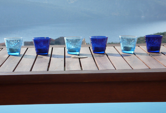 Blue candles by the private pool